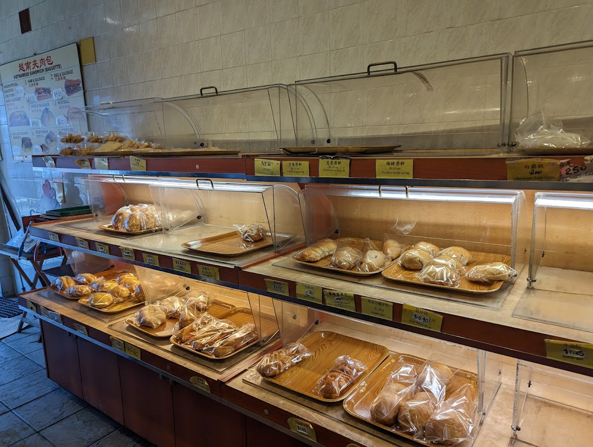 Shelves of packaged buns and pastries